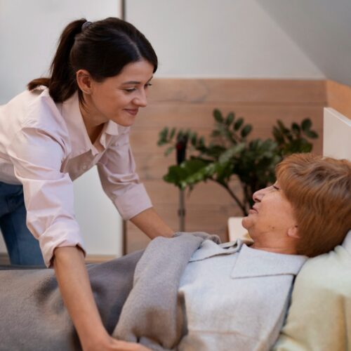female-nurse-taking-care-elderly-person (2)